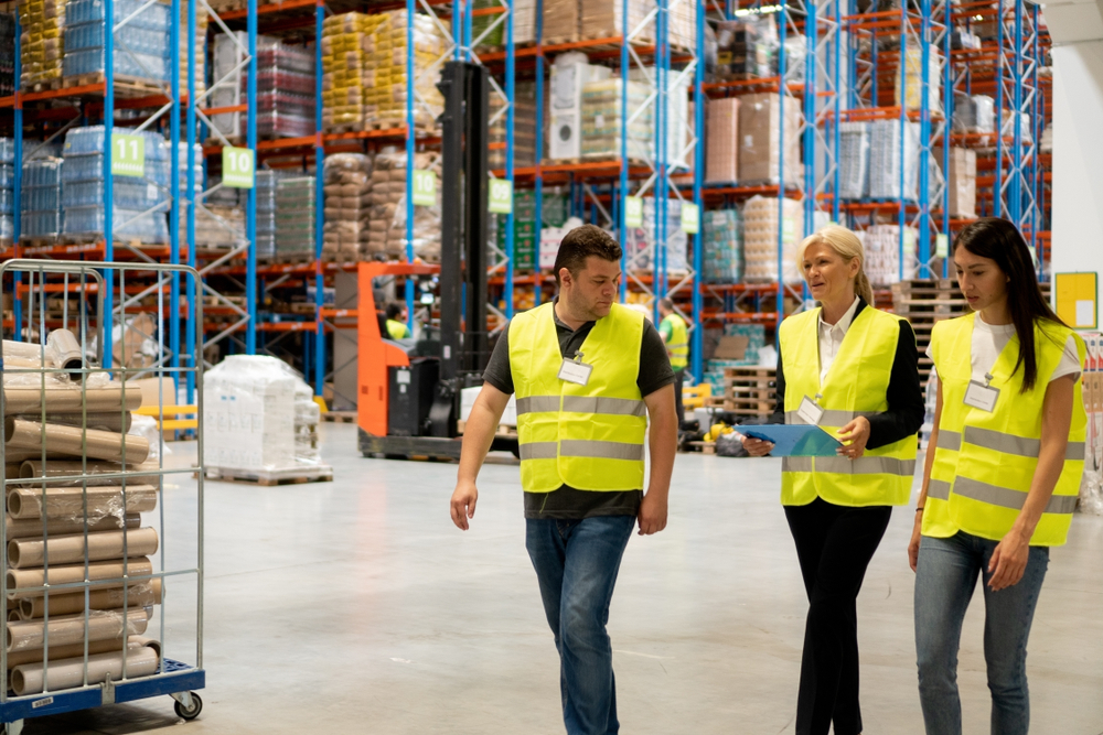 Warehouse Operations - Professional warehouse team managing inventory